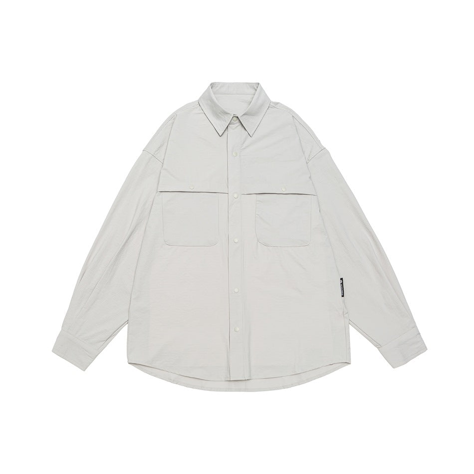 Unisex Weit geschnittene Hemdjacke im Utility‑Stil mit Druckknopfleiste Drune
