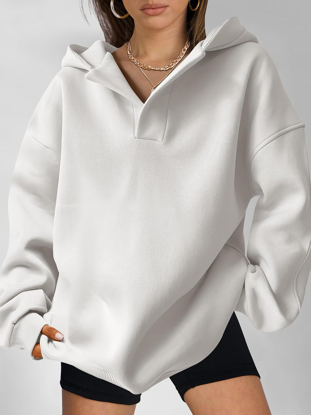 Damen Oversize-Kapuzenpullover aus schwerem Sweatstoff mit V‑Ausschnitt‑Detail und langen Rippbündchen Drune