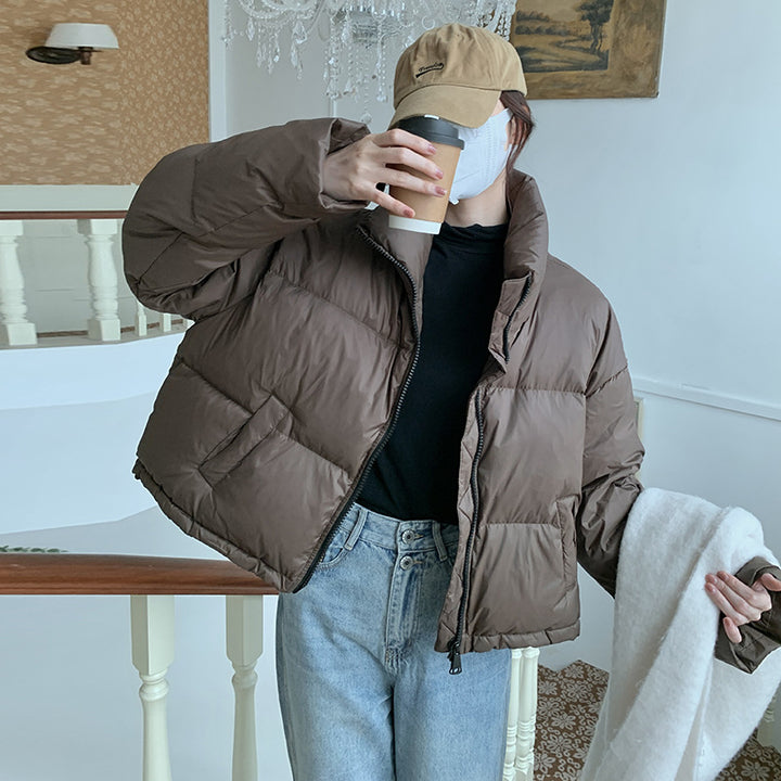 Damen Kurz geschnittene Pufferjacke mit hohem Kragen und seitlichen Taschen Drune