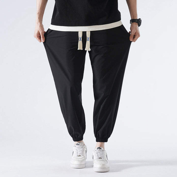 Herren Leichte Relax-Fit-Loungehose aus atmungsaktivem Jersey mit elastischem Tunnelbund, breitem Kordelzug & geripptem Beinabschluss Drune