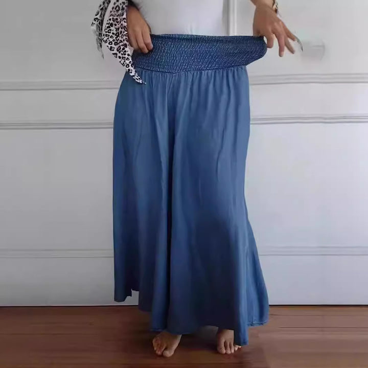 Damen-Maxi-Rock mit hohem Smockbund, weitem Fall und seitlichen Taschen Drune