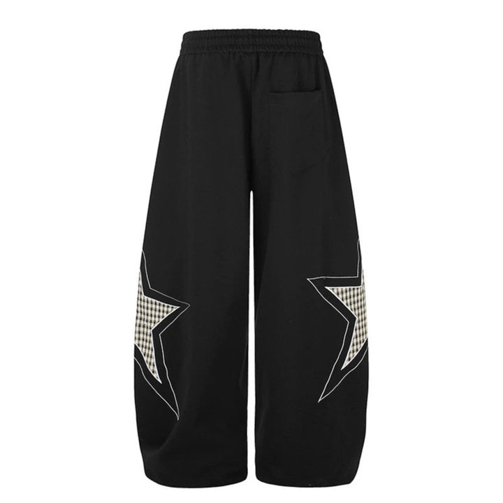 Damen weite Palazzo-Sweathose mit Stern-Applikationen und Karo‑Einsätzen Drune