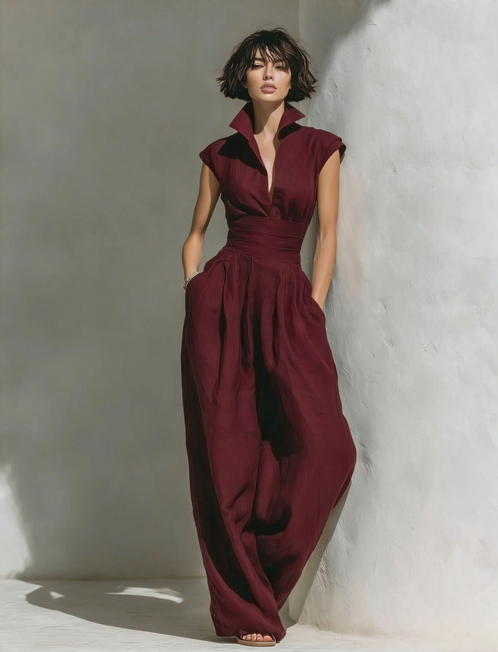 Damen Jumpsuit mit weitem Bein, tailliertem Wickelbund und Stehkragen Drune