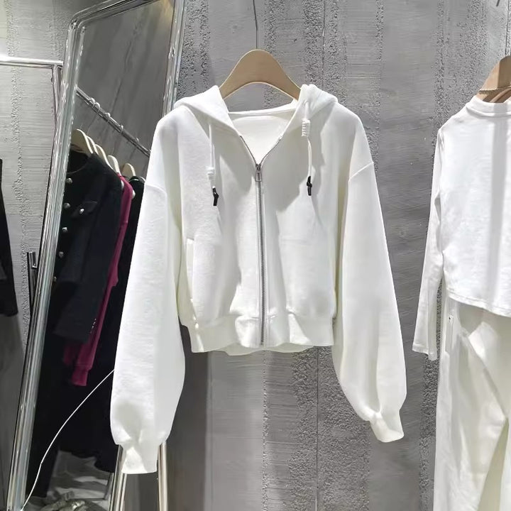 Damen cropped Kapuzenjacke mit lässigem Schnitt und elastischen Bündchen
