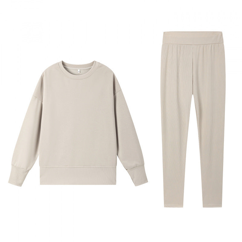 Damen gemütliches Sportset mit lockerem Sweatshirt und enganliegenden Leggings Drune