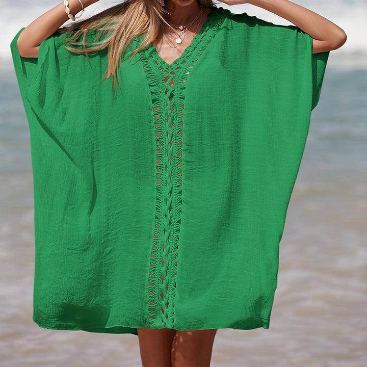 Damen eleganter Strandponcho mit raffinierten Häkelakzenten und tiefem V-Ausschnitt Drune