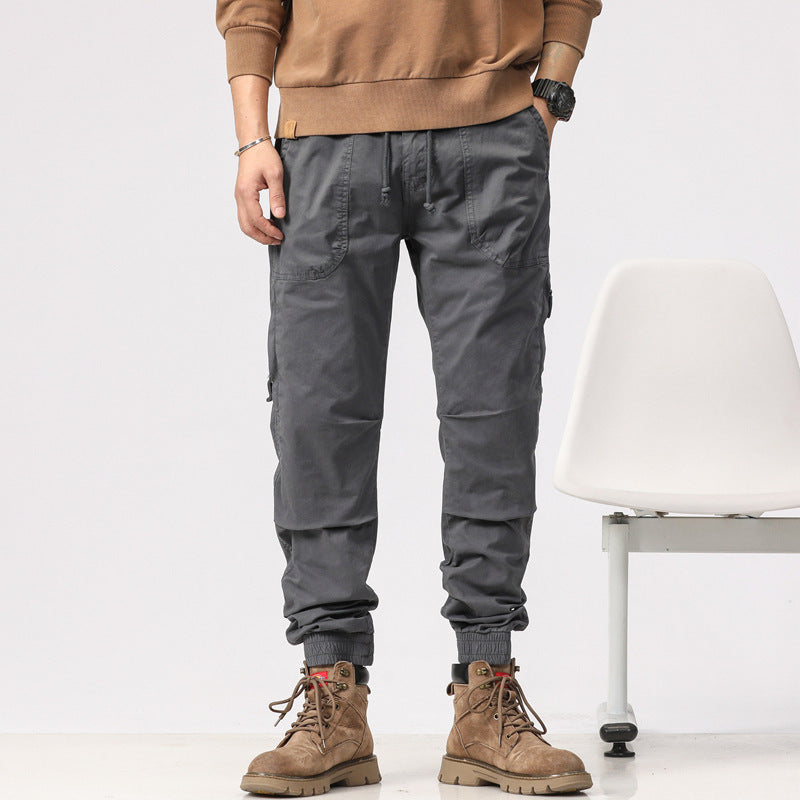 Herren Field-Joggerhose im Military-Workwear-Look mit Ziernähten, aufgesetzten Utility-Taschen und Kordelbund Drune