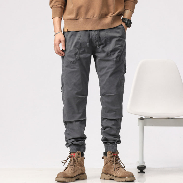 Herren Field-Joggerhose im Military-Workwear-Look mit Ziernähten, aufgesetzten Utility-Taschen und Kordelbund Drune