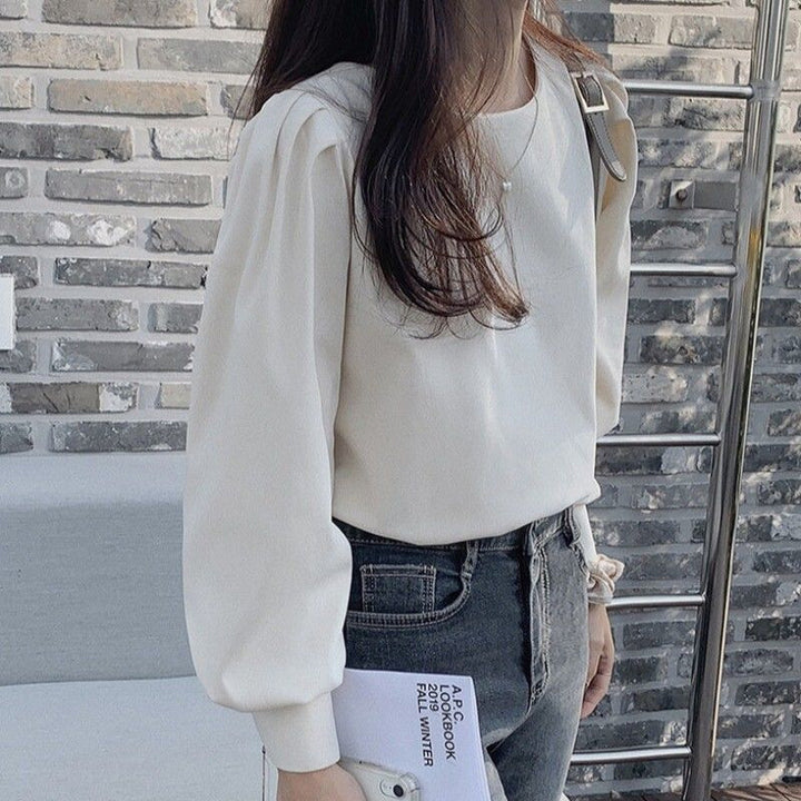 Damen Bluse mit Puffärmeln und vielseitigem Schnitt