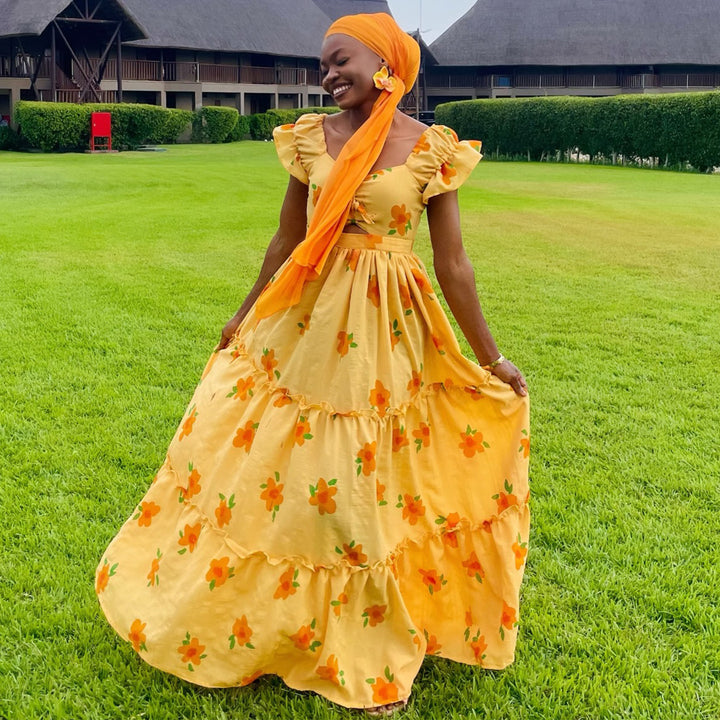 Damen Maxikleid mit voluminösen Rüschen und floralen Akzenten Drune