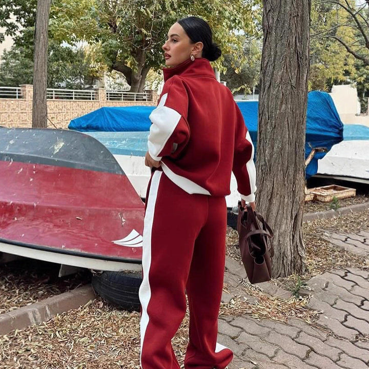 Damen athletisches Zweiteiler-Set aus strukturiertem Sweatstoff mit gekürzter Reißverschlussjacke und hochgeschnittener Jogginghose mit weitem Beinverlauf Drune