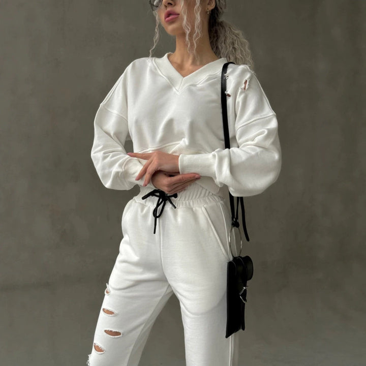 Damen kurzgeschnittenes Sweat-Set mit V-Ausschnitt, Rüschenbund Highwaist Jogginghose und Distressed-Details Drune