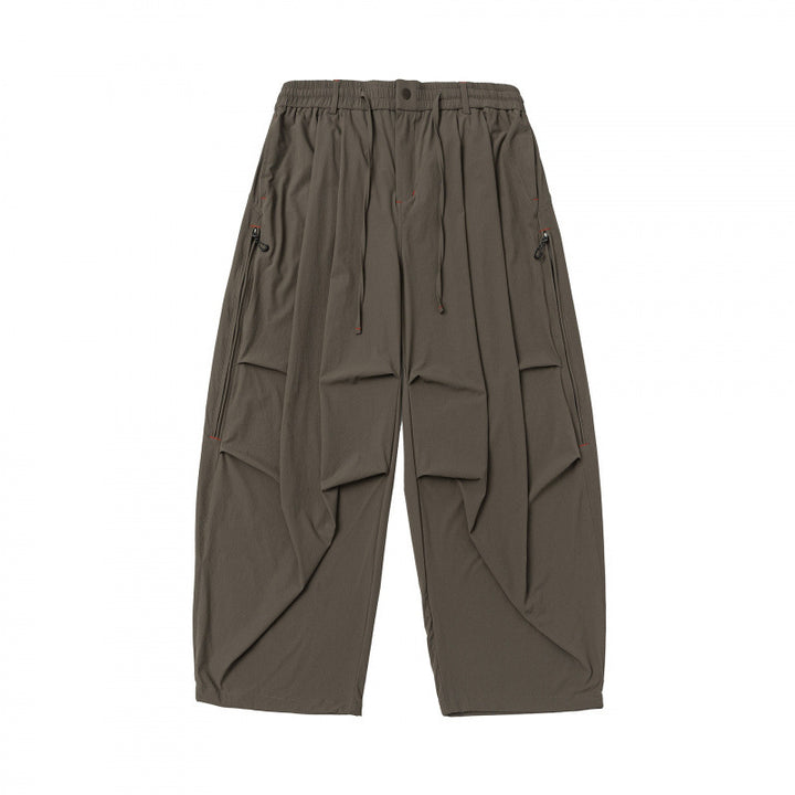 Unisex Weitgeschnittene technische Cargo-Hose mit Gummibund, Kordelzug und Reißverschlusstaschen Drune