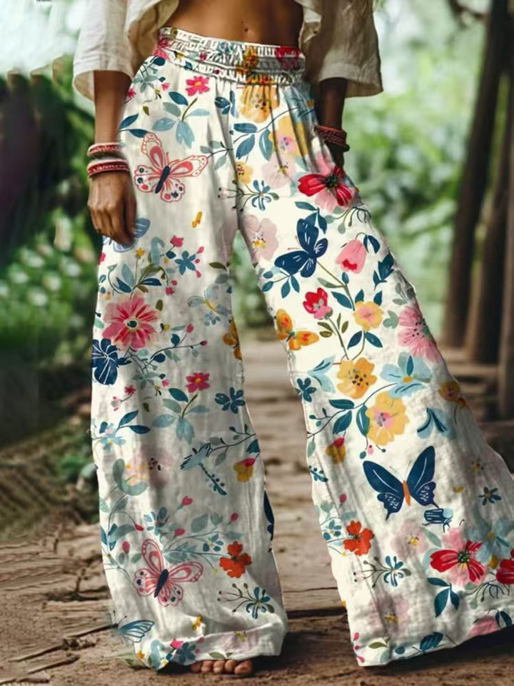 Damen Weite Sommerhose mit buntem Blumen- und Schmetterlingsprint Drune
