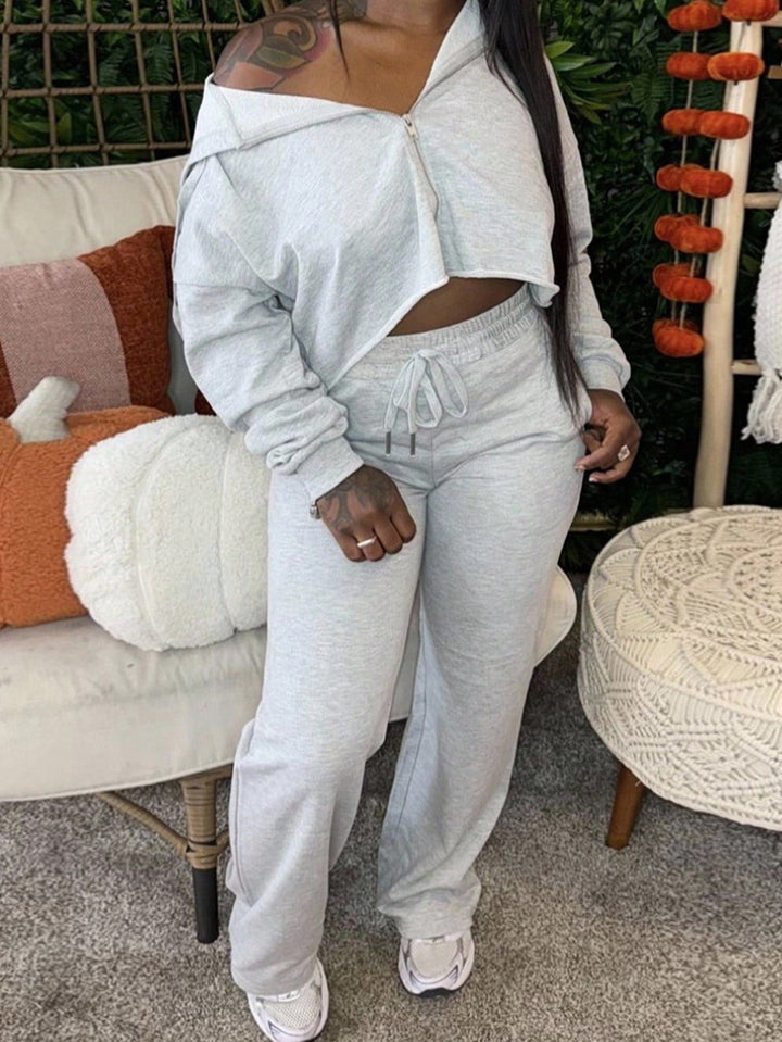 Damen sportliches Set aus cropped Kapuzenpullover und lässigen Jogginghosen mit Kordelzug