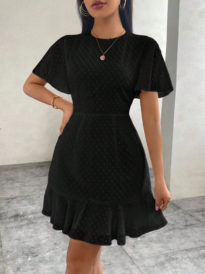 Drune | Dreidimensionales Kleid mit Rüschenrand und Punkten