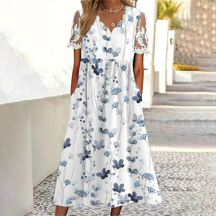 Drune | Pendelkleid mit Blumendruck und V-Ausschnitt