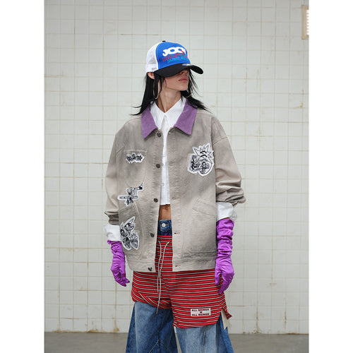 Unisex Kastig geschnittene Chorejacke aus Baumwollcanvas mit artistischen Patch Applikationen und Cordkragen Drune