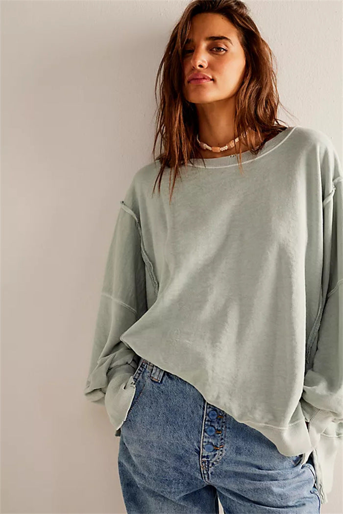 Damen oversized Sweatshirt mit Ballonärmeln, offenen Saumnähten und seitlichen Schlitzen Drune