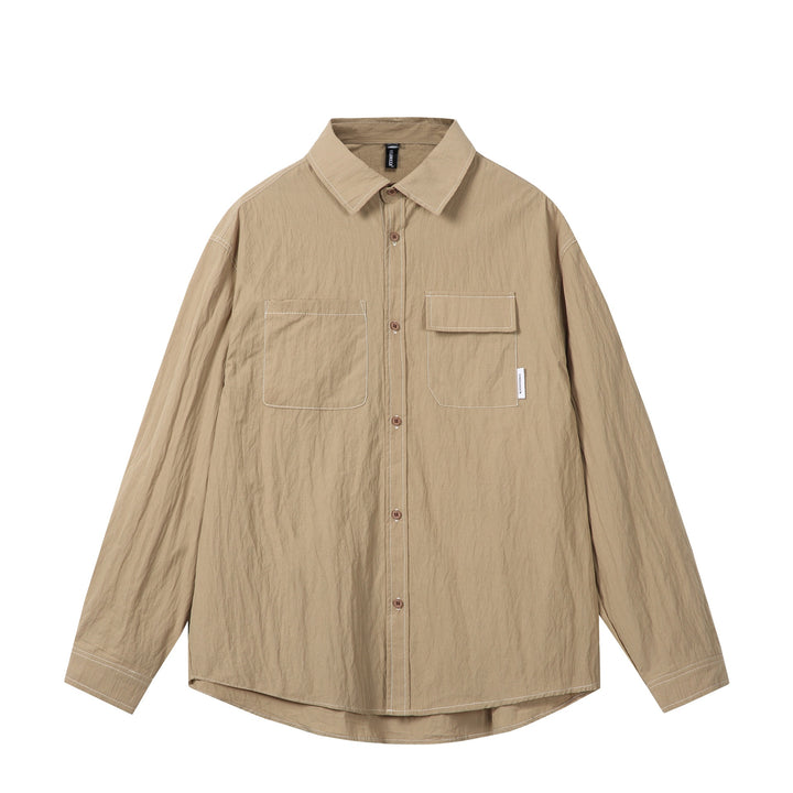 Unisex Oversize-Hemdjacke mit markanten Kontrastnähten und aufgesetzten Brusttaschen Drune