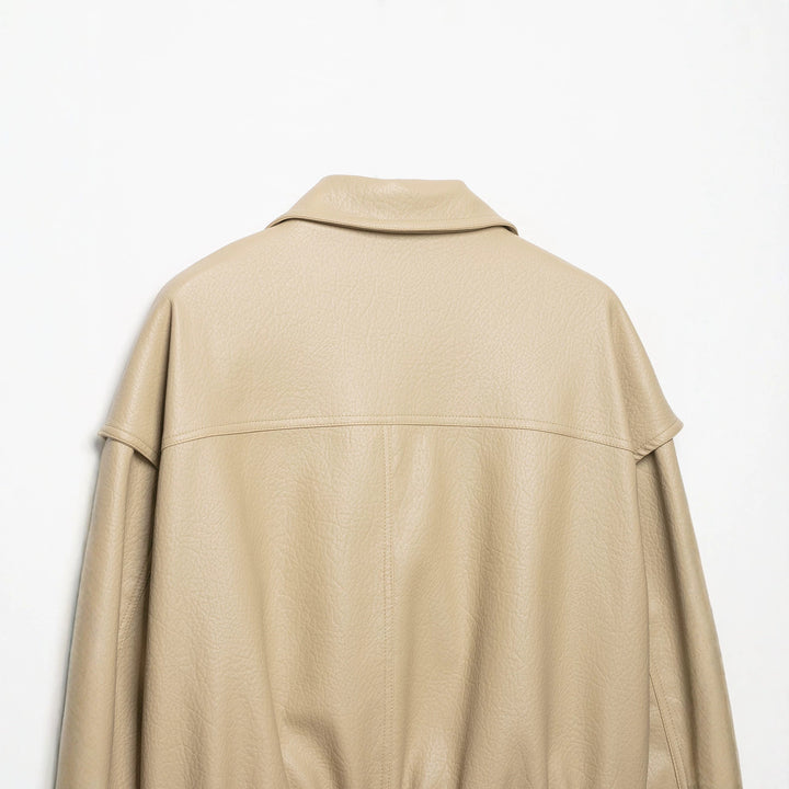 Damen Kurzjacke aus Kunstleder mit breitem Revers und gerafftem Saum Drune