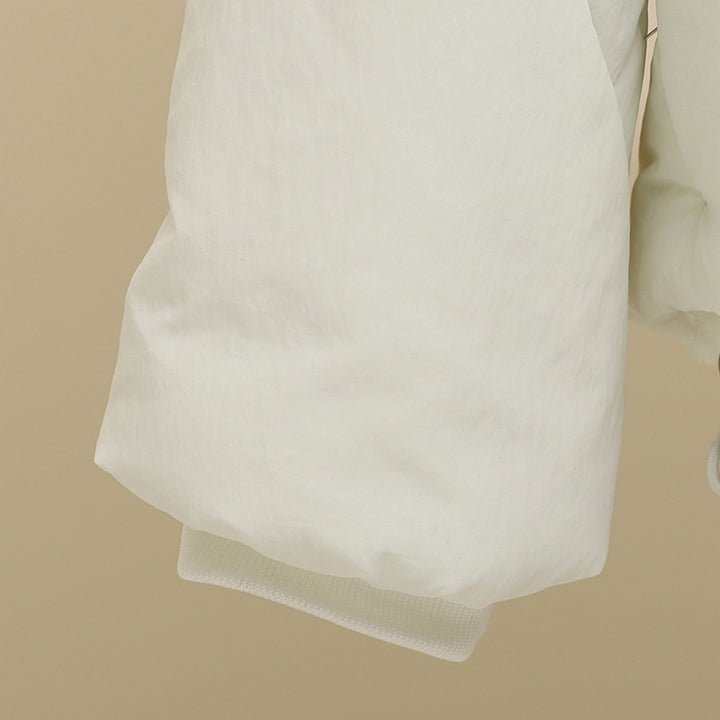Damen nan gesteppte Kapuzenjacke mit kurzem Boxy‑Schnitt, verstellbarem Saum und wärmender Wattierung Drune