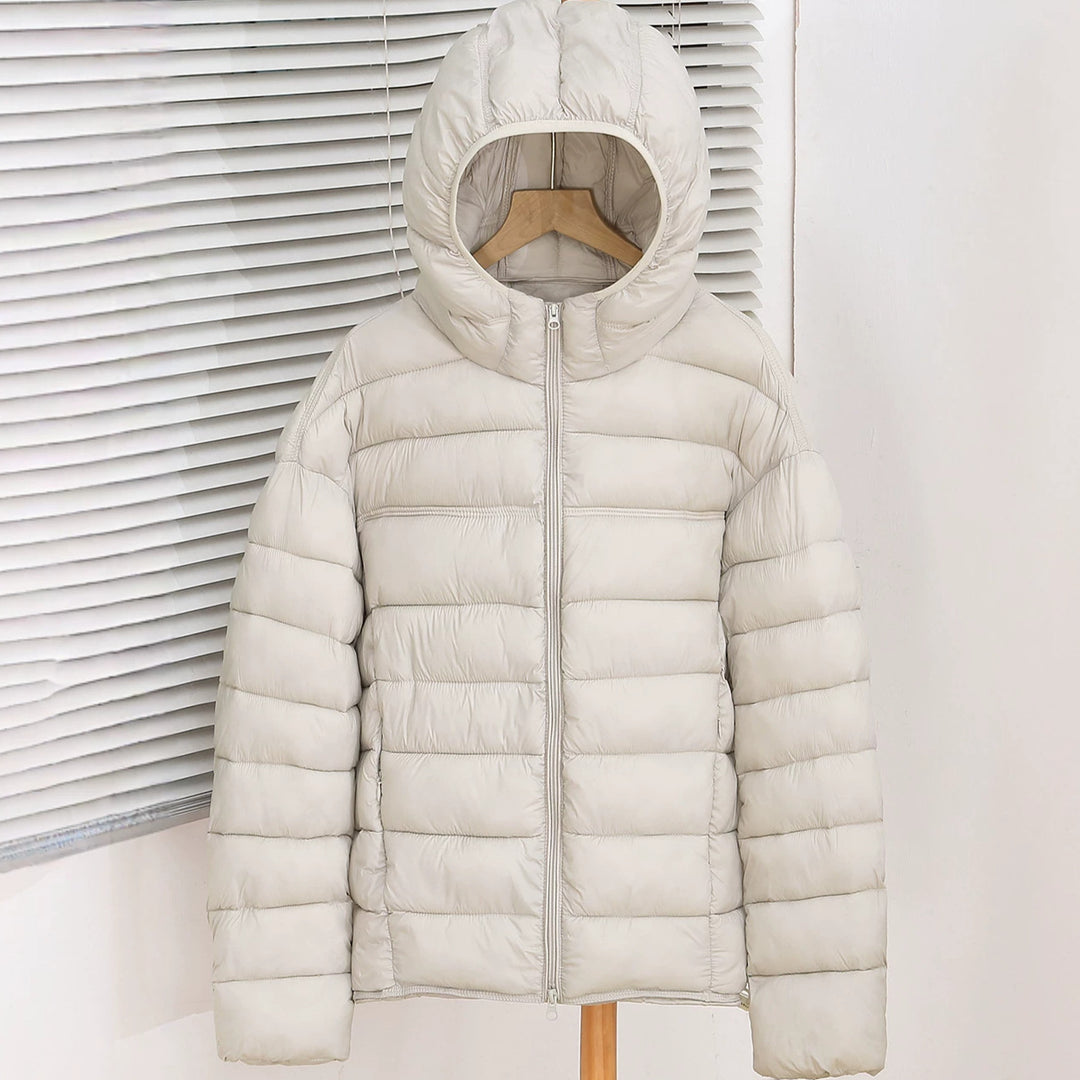 Damen Leichte Kapuzen‑Pufferjacke mit schmaler Quersteppung und ergonomischer Kapuze Drune