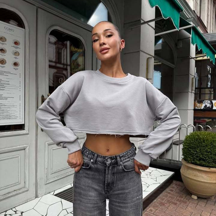 Damen Kurzgeschnittenes Sweatshirt mit ausfransendem Saum und überschnittener Schulter Drune