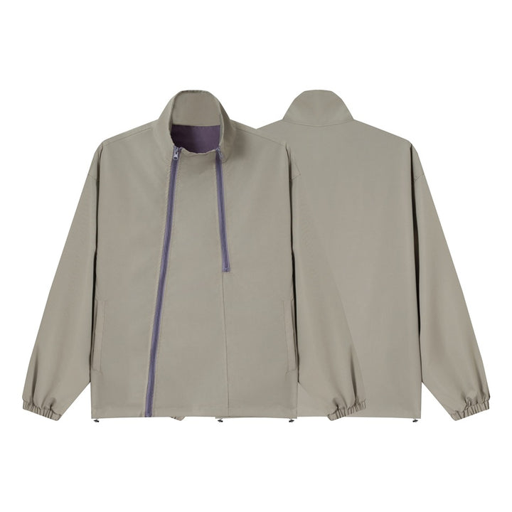 Unisex Kurz geschnittene technische Windjacke mit asymmetrischem Zwei‑Wege‑Reißverschluss, abnehmbarer Sturmhaube und Umhänge‑Minitasche Drune