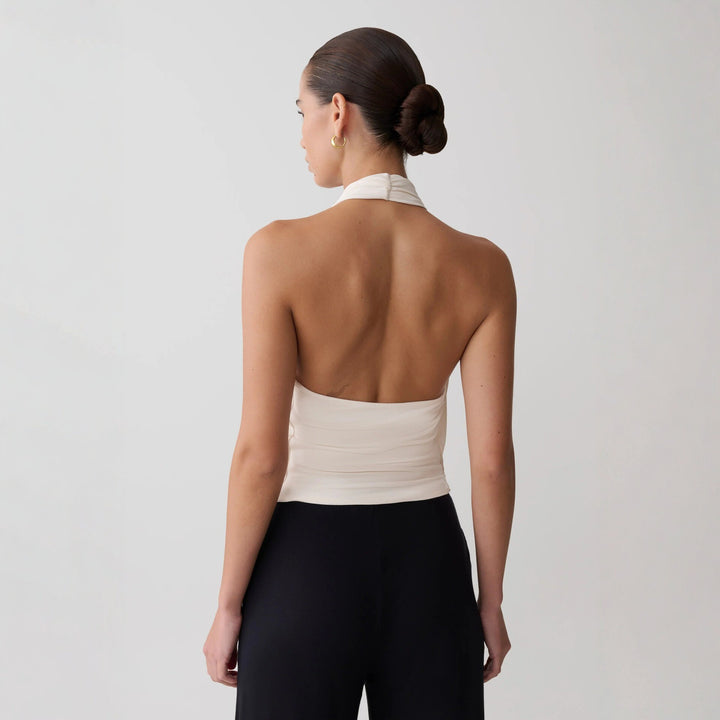 Damen Elegantes Halterneck-Top mit fließendem Stoff und tiefem Ausschnitt Drune