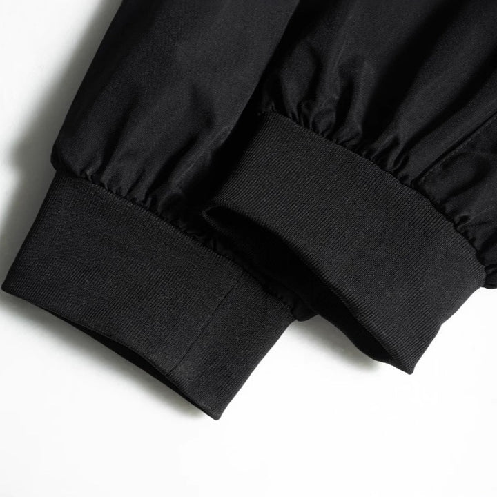 Herren Tech‑Cargo‑Jogger mit taktischen Klappentaschen, verstellbaren Nylonriemen und elastischem Knöchelsaum Drune