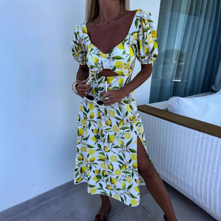 Damen Maxi Kleid mit Fruchtmotiv und Cut-Out-Details Drune