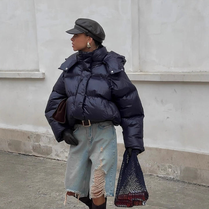 Damen Kurz geschnittene glänzende Oversize-Steppjacke mit hohem Kragen Drune