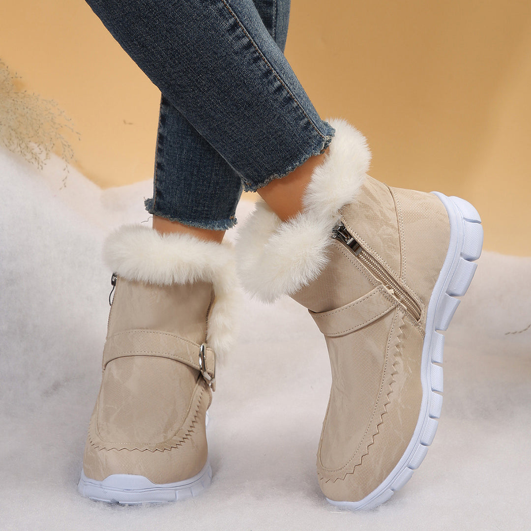 Damen nan gefütterte Kurzstiefel mit Kunstfellbesatz, Velourslederoptik, seitlichem Reißverschluss, dekorativer Metallschnalle und profilierter Lightweight-Sohle Drune