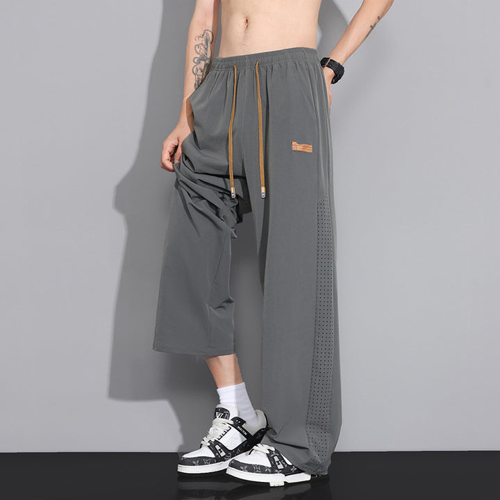 Herren Atmungsaktive Sporthose mit Netzbesätzen
