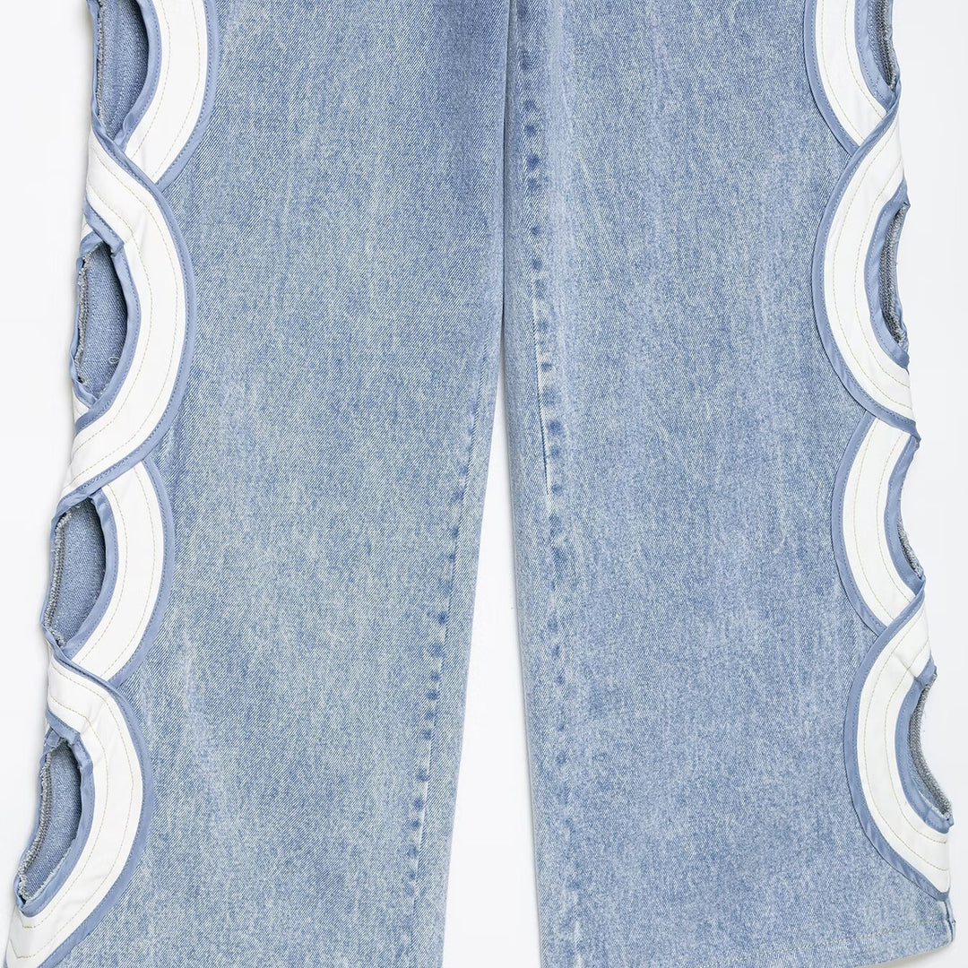 Damen High-Waist-Jeans mit ausgestellter Weitbein-Silhouette und seitlichen Kreis-Applikationen Drune
