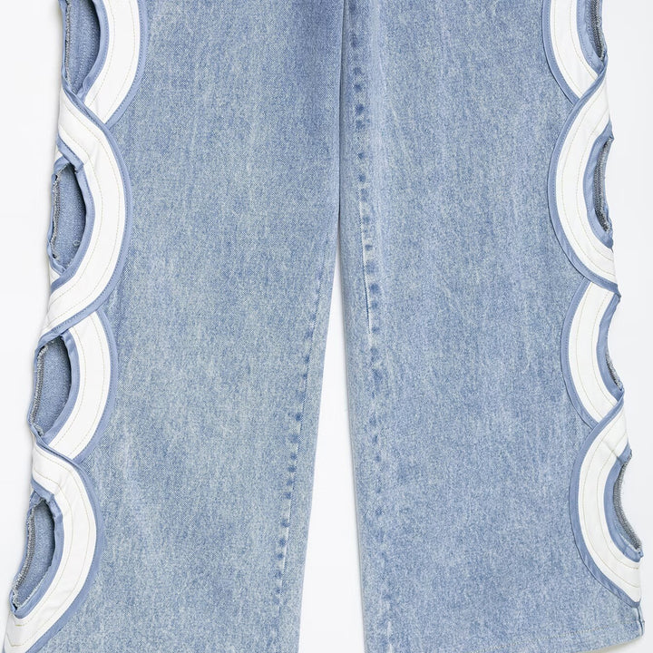 Damen High-Waist-Jeans mit ausgestellter Weitbein-Silhouette und seitlichen Kreis-Applikationen Drune
