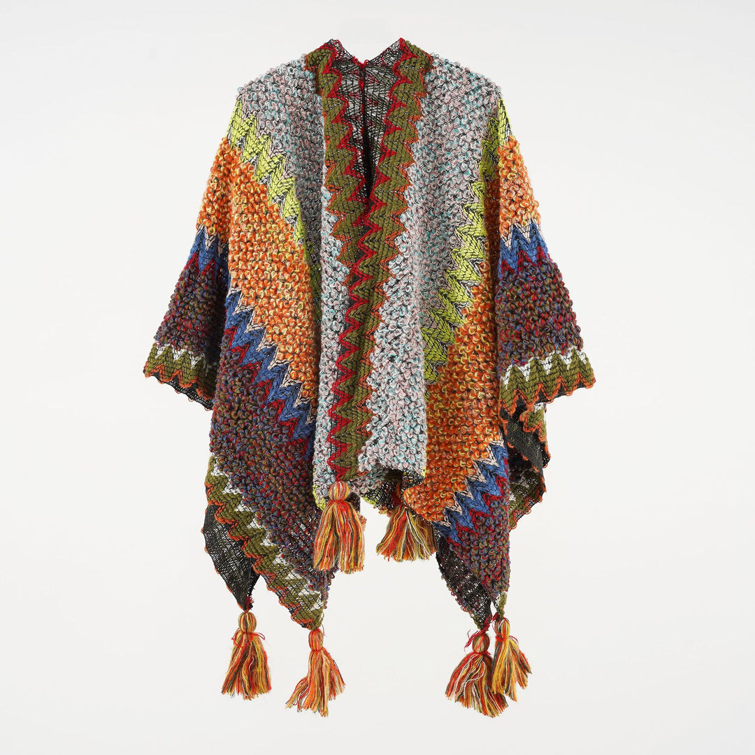 Damen strukturierter Bouclé-Strickponcho mit Jacquardmuster und Quasten Drune