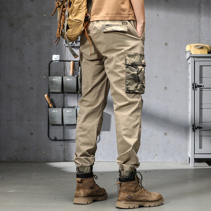 Herren Outdoor‑Cargohose im Joggerstil mit Camouflage‑Kontrast, ergonomischen Knieabnähern und elastischem Komfortbund Drune