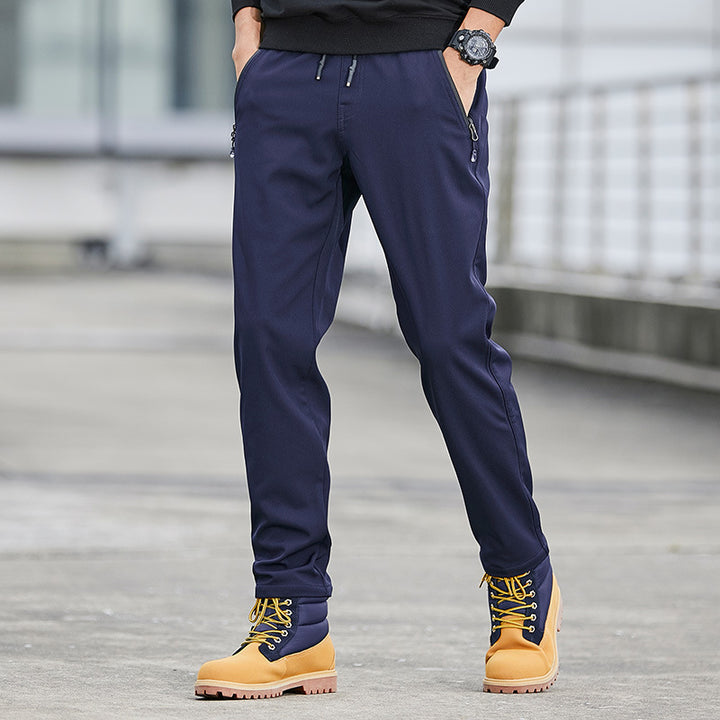 Herren Technische Softshell-Jogginghose mit wasserabweisender Membran, Reißverschlusstaschen und elastischem Kordelbund Drune