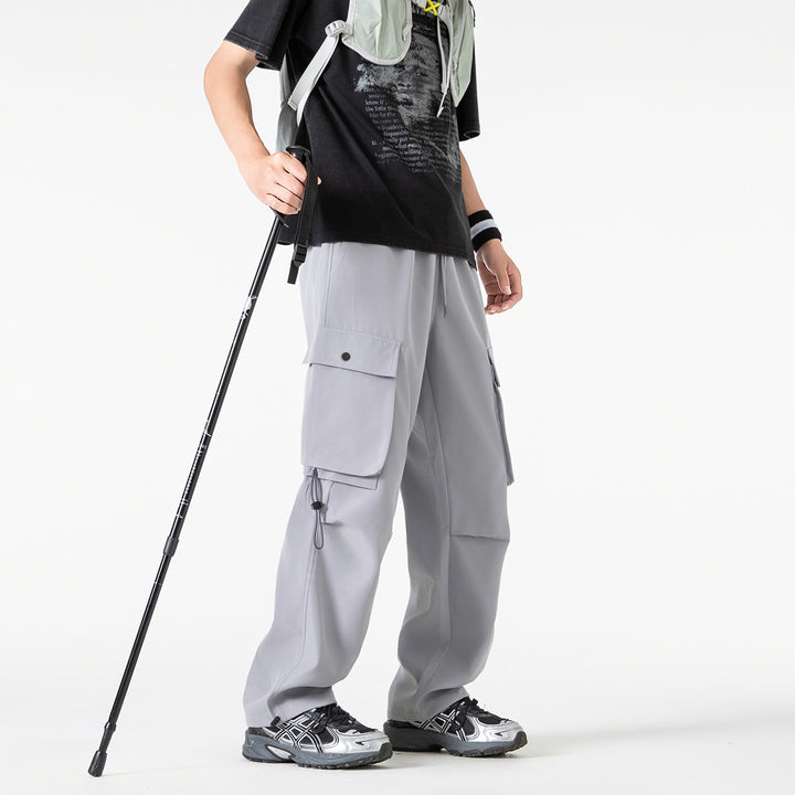Herren Baggy‑Cargohose im Tech‑Utility‑Stil mit elastischem Tunnelzugbund, großen Klappfächern und Zipper‑Details Drune