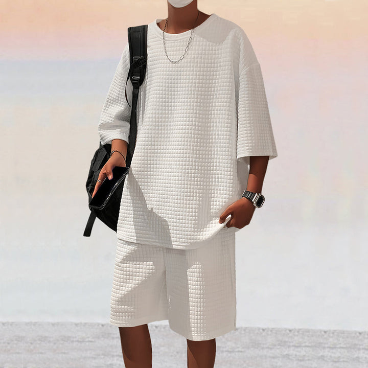 Herren nan quadratstruktur Freizeitset mit oversized Rundhalsshirt und knielangen Relax-Shorts Drune