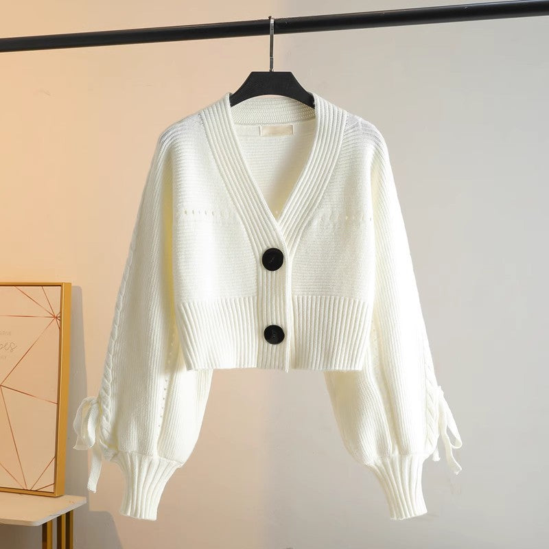 Damen modische Strickjacke mit voluminösen Ärmeln und Knopfdetails Drune