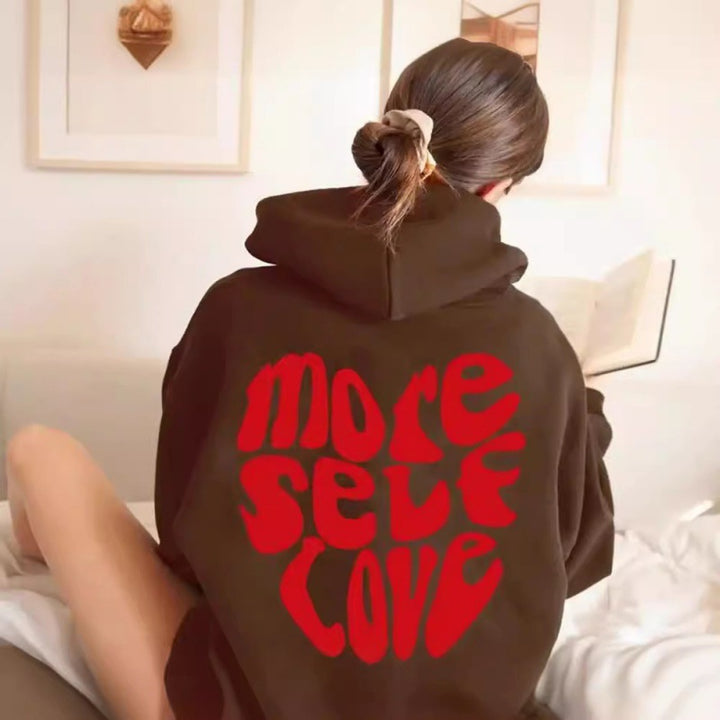 Damen Kapuzenpullover mit auffälligem Schriftzug und oversized Passform Drune