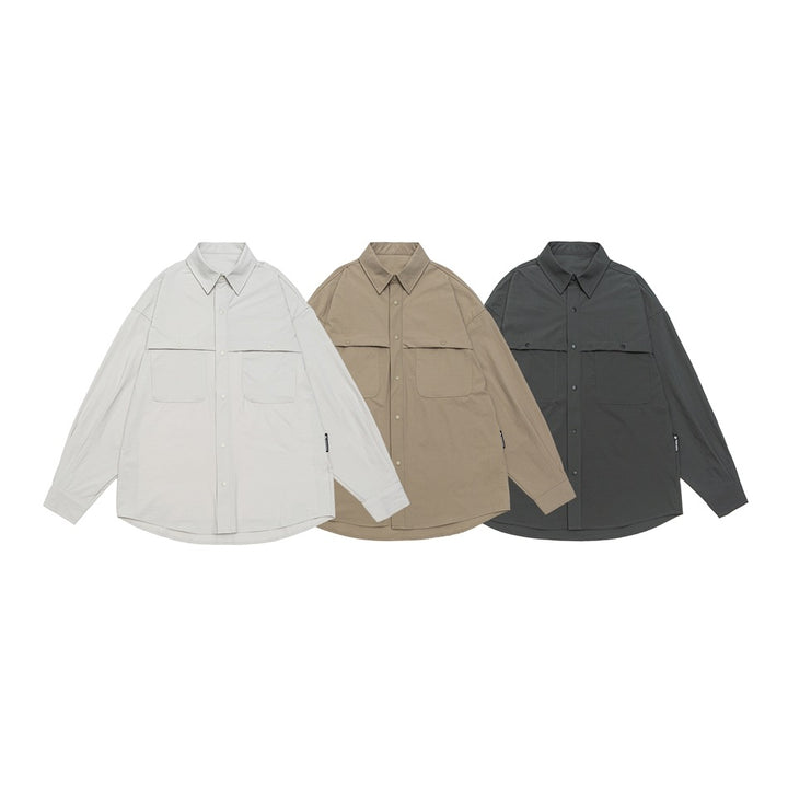 Unisex Weit geschnittene Hemdjacke im Utility‑Stil mit Druckknopfleiste Drune