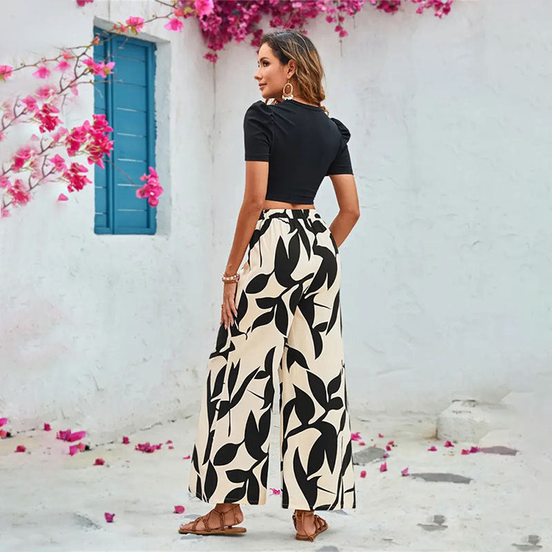 Damen Elegante weite Hose mit floralem Muster Drune