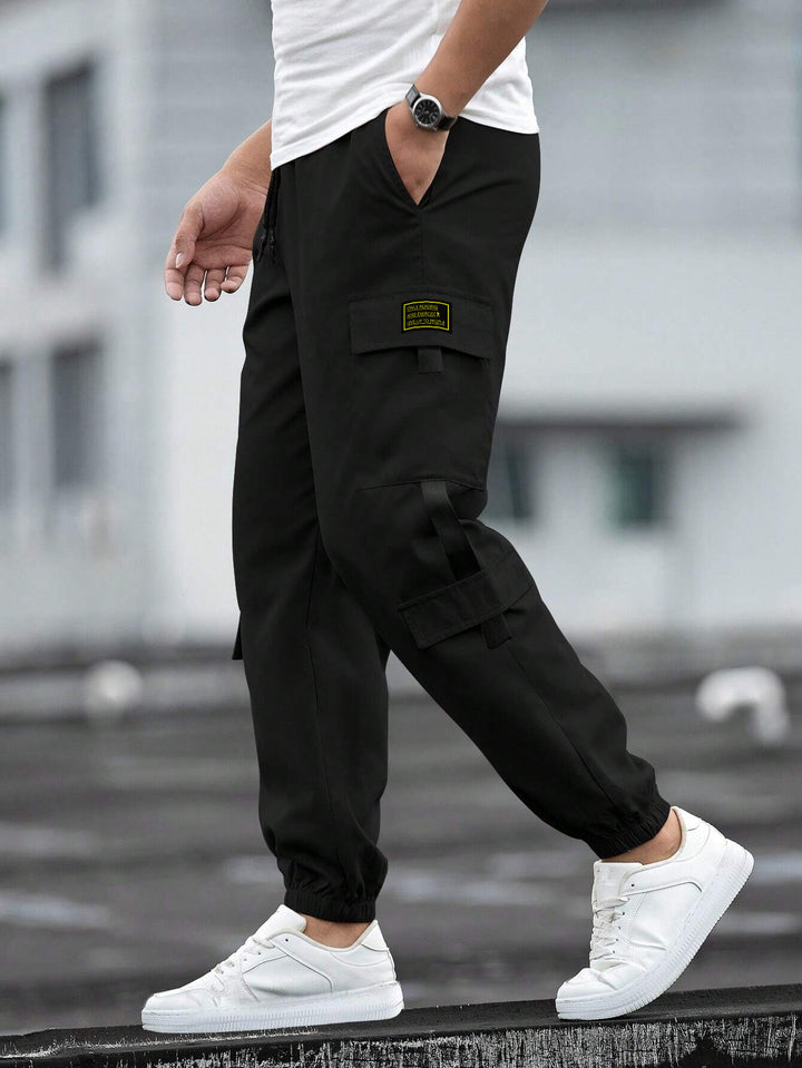 Herren modische Cargo-Joggerhose mit elastischem Bund, Kordelzug und mehreren Sicherheits- und Klappentaschen Drune