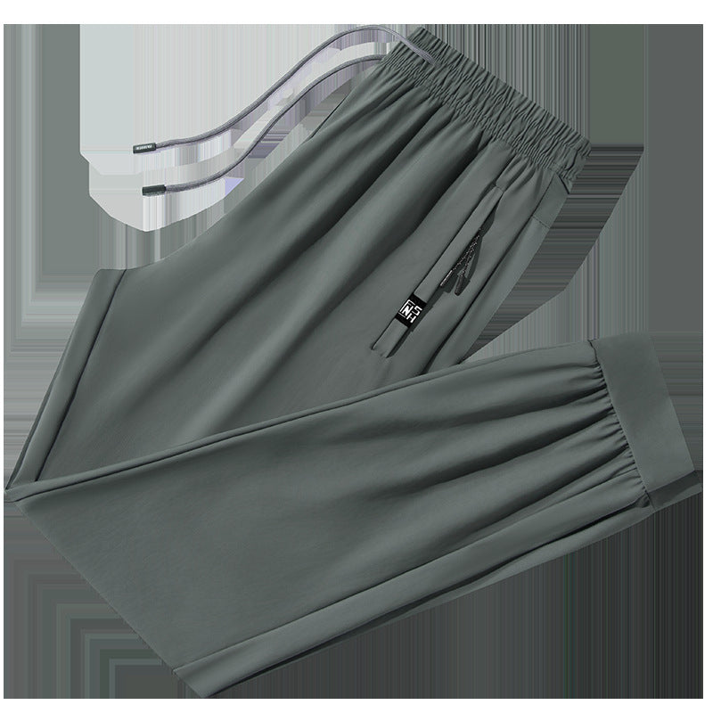 Herren urban performance Jogginghose mit elastischem Kordelbund, verdeckter Reißverschlusstasche und geradem Bein Drune