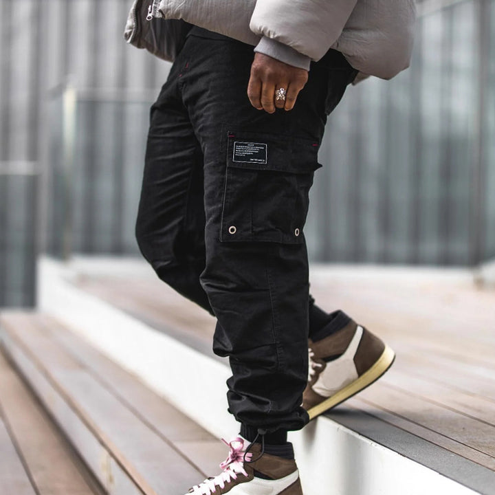 Herren nan urbaner Utility-Jogger mit geknöpften Cargotaschen und verstellbarem Knöchelzug Drune