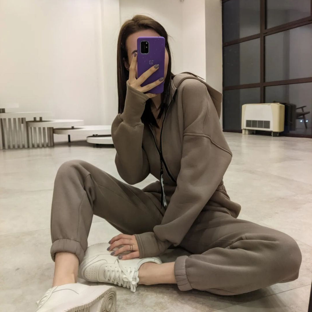 Damen taillierter Sweat-Jumpsuit mit halbem Reißverschluss, elastischem Bund und Kängurutaschen Drune